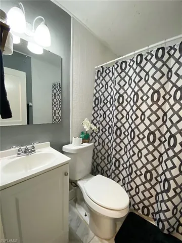 Bathroom featuring toilet and vanity