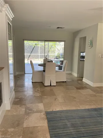 Dining room with healthy amount of natural light