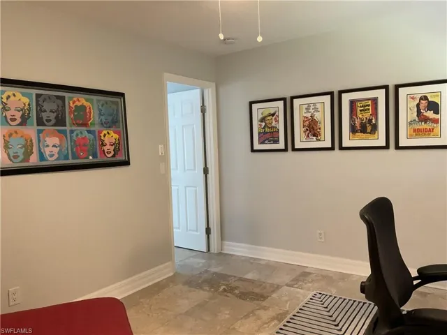 Office area with baseboards