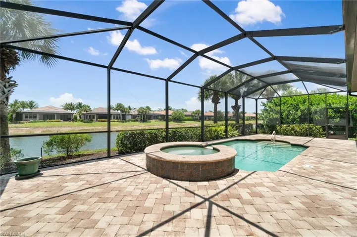 Private pool and spa overlook the serene lake