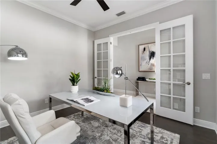 Glass pane, French Doors offer privacy to the downstairs office space