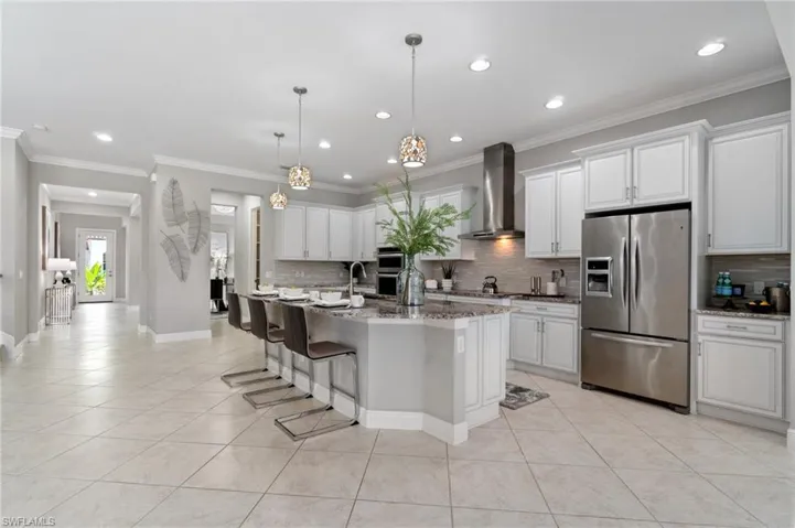 Kitchenaid stainless appliances and custom cabinets await...