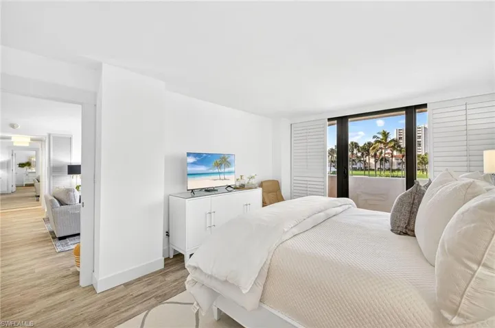 Bedroom featuring light wood-type flooring and access to outside