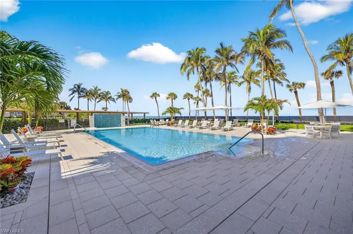 Community pool and spa overlooking the Gulf