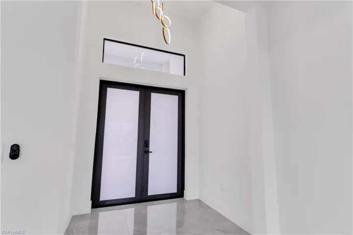 Foyer featuring french doors