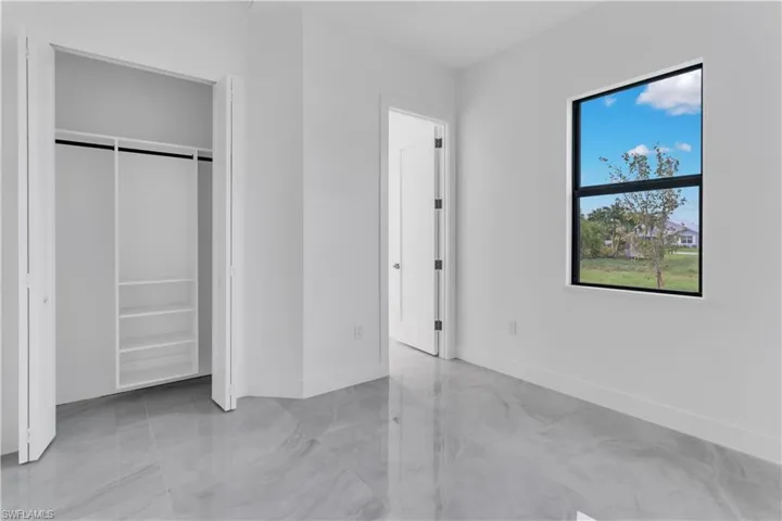 Unfurnished bedroom featuring a closet