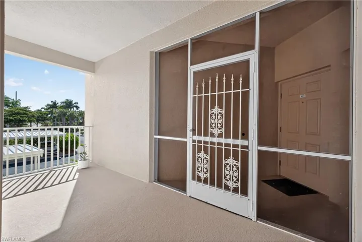 Screened entry to home.  storage unit directly across from unit