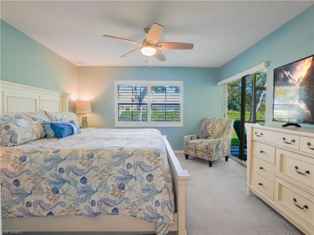 Primary Bedroom with sliding door to lanai
