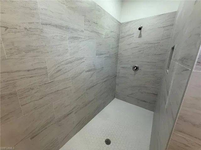 Bathroom with a tile shower