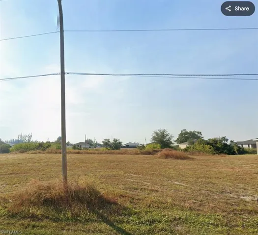 Expansive cleared lot featuring level terrain
