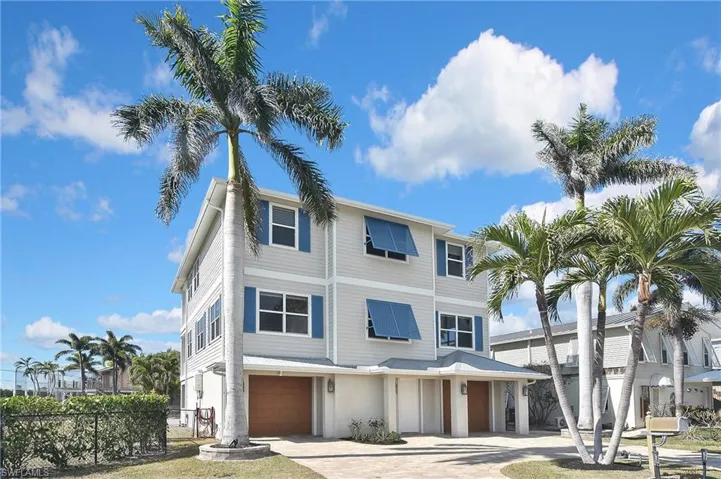 View of front of home featuring a garage
