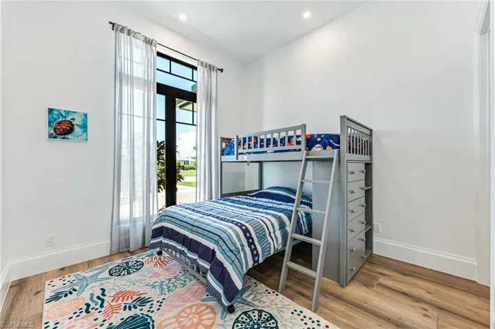 Bedroom featuring light wood-style flooring
