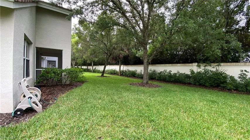 View of yard featuring view of scattered trees