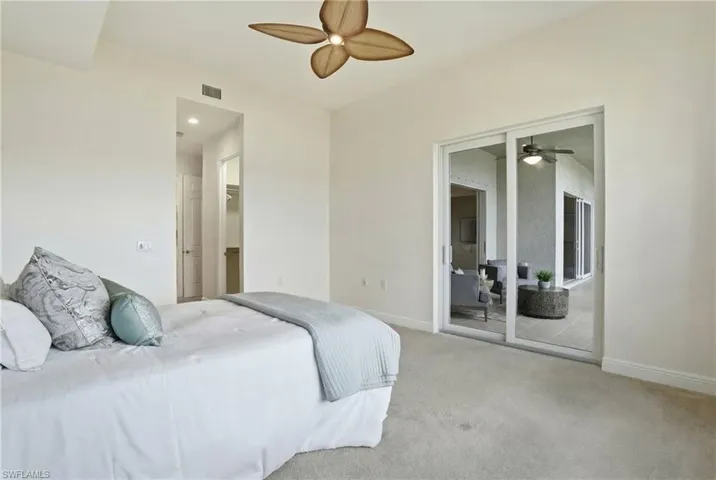 Bedroom, a spacious closet, ceiling fan, and access to exterior
