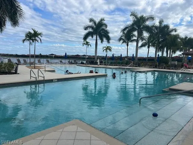 Community pool with a gazebo and a patio