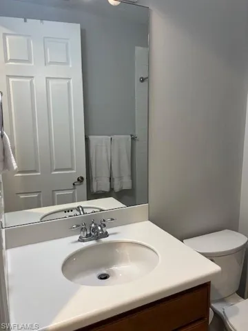 Bathroom featuring vanity and tub/shower combo