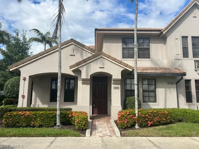 Mediterranean / spanish home with stucco siding