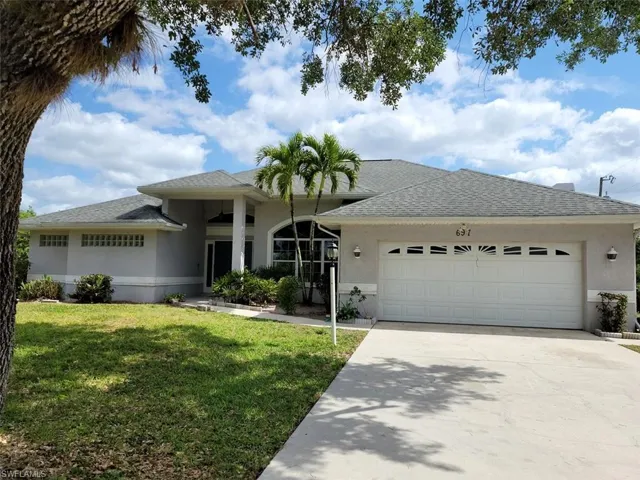 697 Creuset AVE S, LEHIGH ACRES FL 33974