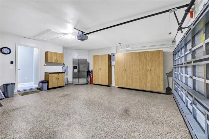 Garage with Custom Storage, Soak Sink, etc.