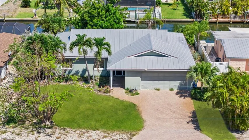 virtually enhanced imagedrone shoot of the front of the house
