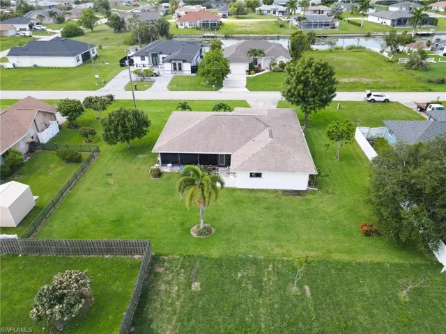 Aerial view of residential area with a nearby body of water