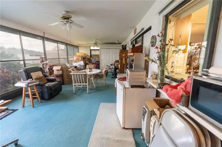 Enormous Screened-in Lanai with storage.