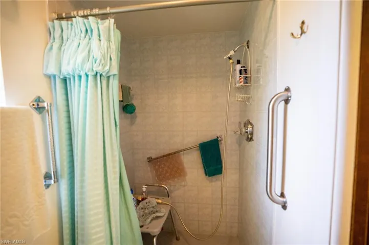 Master Bathroom featuring a tile shower