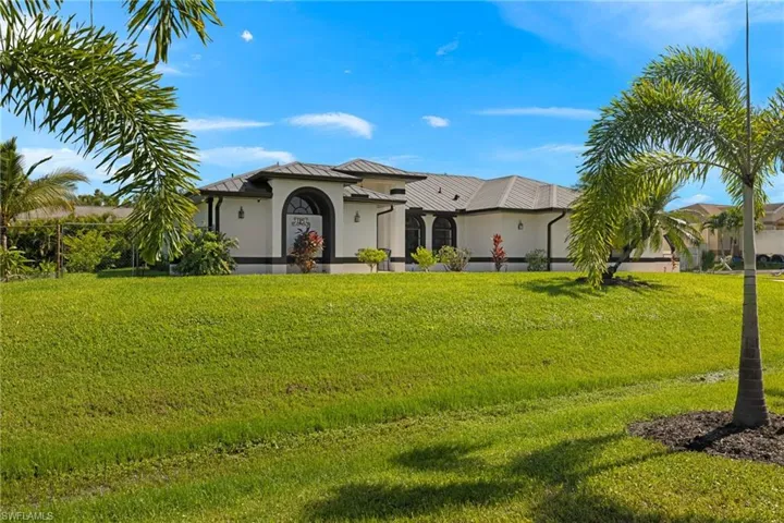 View of front of house with a front yard