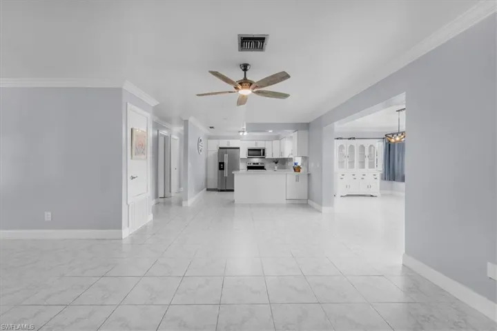 Living room with kitchen/dining and bonus room