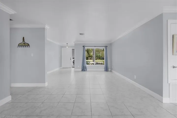 Front entry into foyer and family room