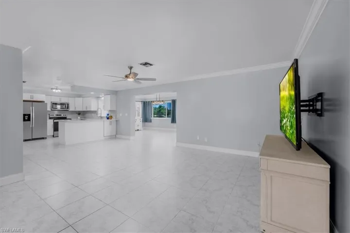 Living room into kitchen and bonus room