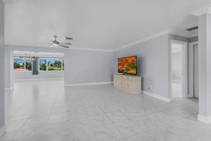 Living room with view of bonus room