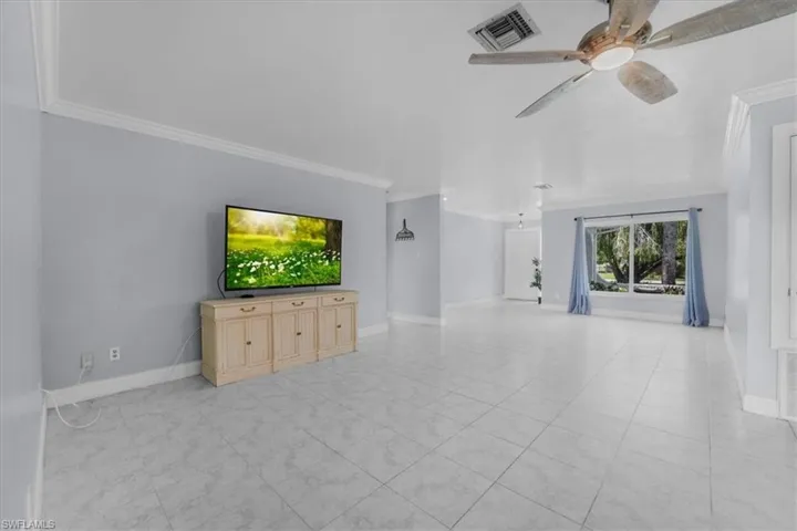 Living room with view of family room