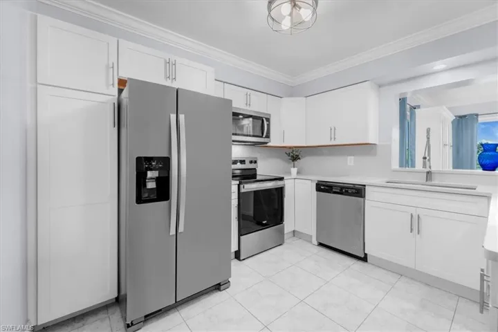 Stainless steel appliances and quartz countertops