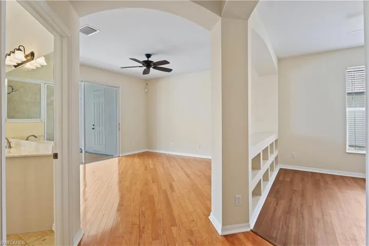 Generous primary suite featuring a main sleeping area plus a separate nook ideal for a nursery, sitting area, or private den—perfect for customizing your personal retreat.