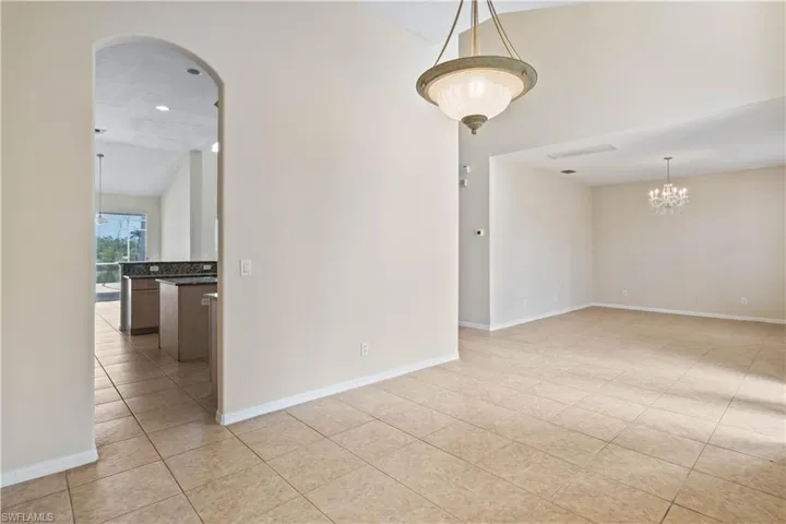 Sophisticated dining space with easy access to the gourmet kitchen, making meal service effortless. Bright and airy, perfect for hosting dinner parties or special family occasions.