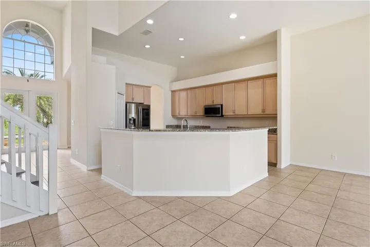 Designed for both everyday cooking and entertaining, with plenty of natural light and an open flow to the breakfast nook and living areas.