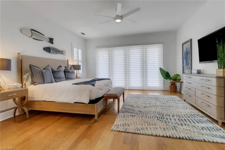 The very large "Bonus" room on the second floor is currently used as Bedroom #5 with beautiful wood floors, closet, full bath with shower.