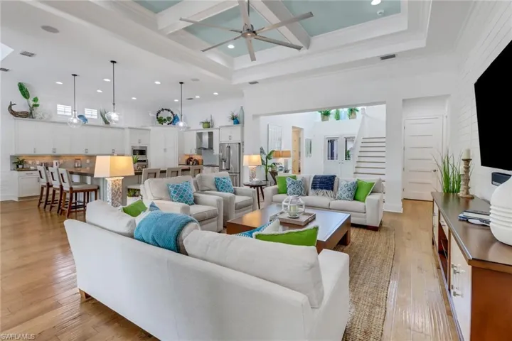 This view of the living room adjacent to the gourmet kitchen presents a better image of the large size of this great room.