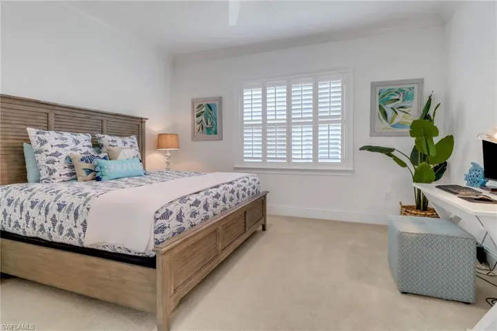 This view is of the den, setup as a bedroom - currently without furniture but shown as optional 6th bedroom.