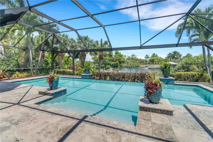 The oversized pool welcomes you for fun in the sun.