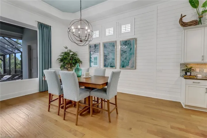 The dining room table seats 6 but easily handles a larger table.