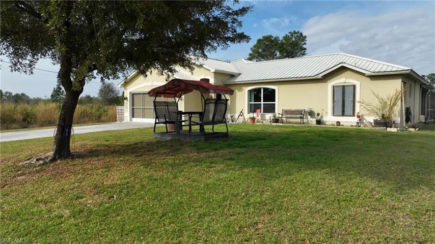 919 Maple AVE N, LEHIGH ACRES FL 33972