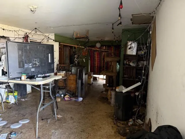 Misc room with a workshop area