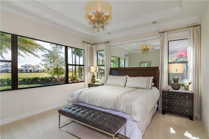 Downstairs primary with morning sunrise views