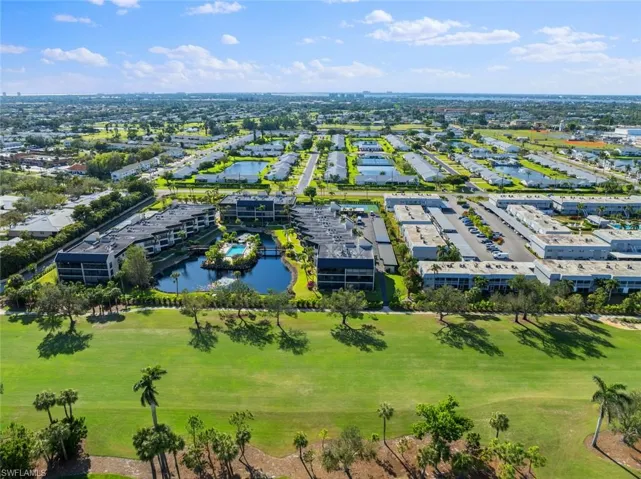 Drone / aerial view of a large body of water and a golf club