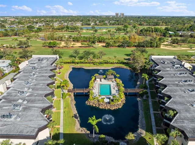 Aerial view of a large body of water and a local golf course