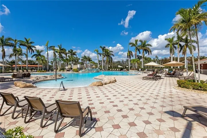 Community pool with a patio area