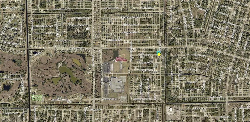 Aerial Map. Illustrating the property's location within a residential and commercial area
