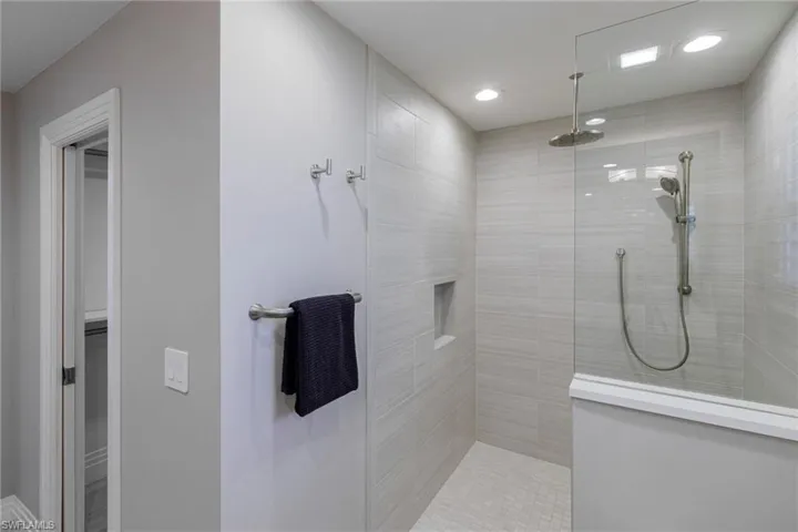 Bathroom with tiled shower